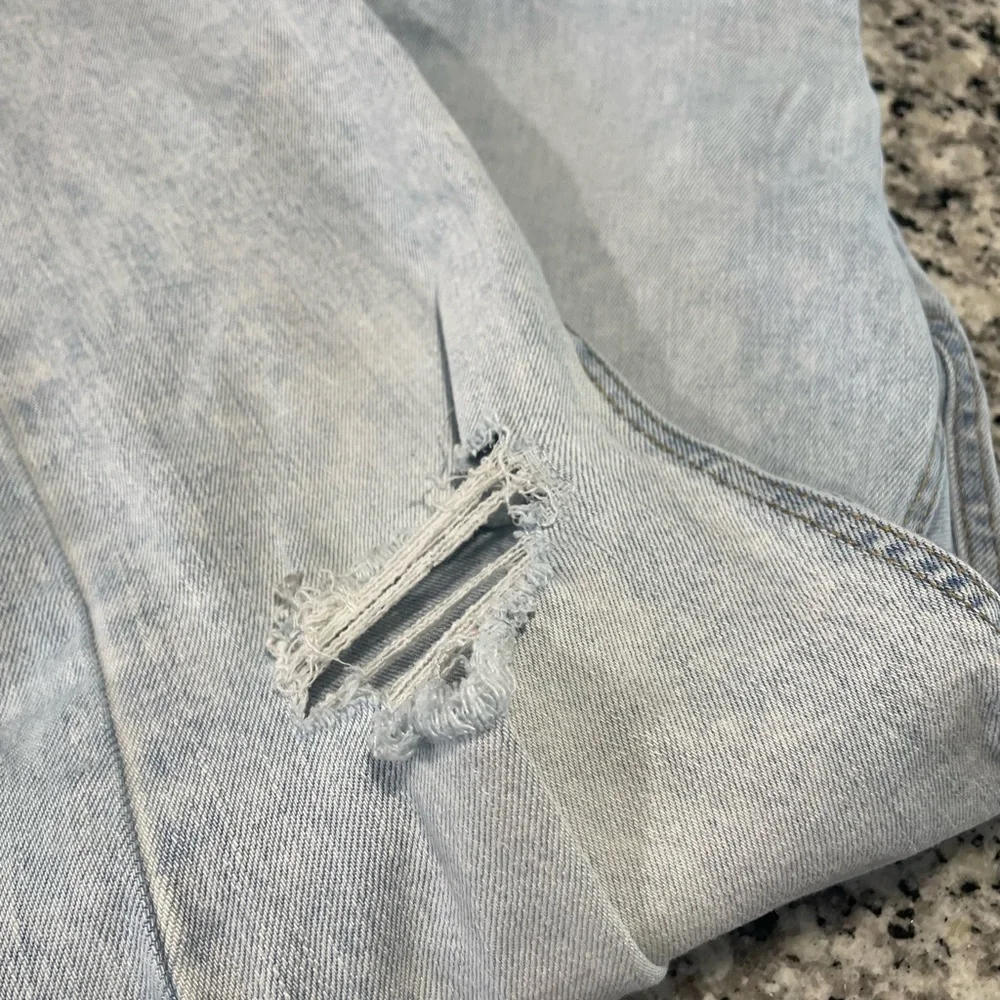 Light Wash Distressed Jeans - Picture 6 of 8
